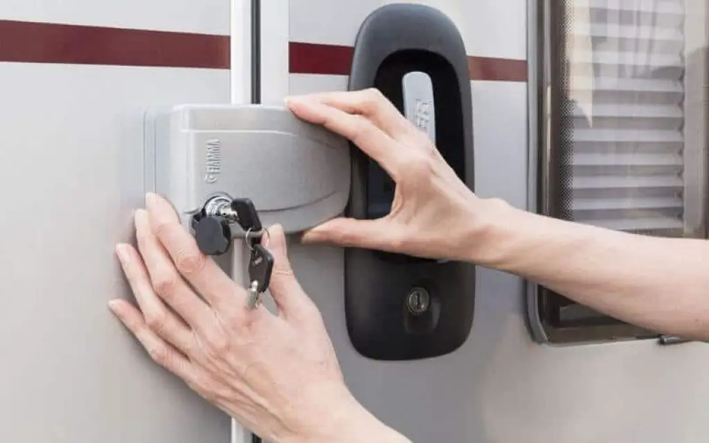 Can I install an additional lock on an existing RV door